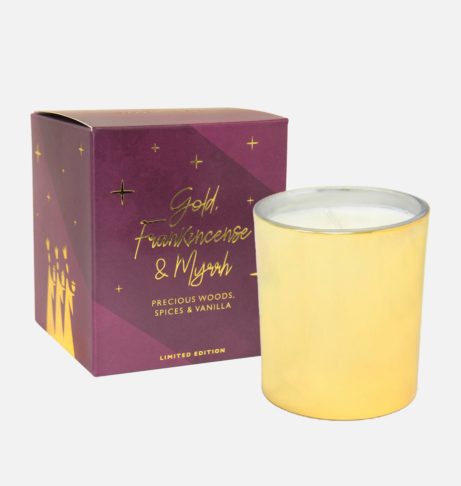 gold candle in jar with gift box